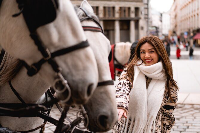 1.5 Hour Cinematic Style Portrait Photoshoot and Tour in Vienna - Hofburg Palace: gates, yards, and charming horse-carriage energy