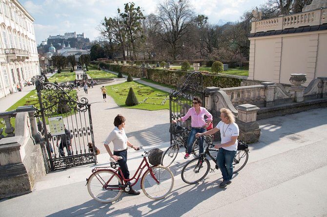 Discover Salzburg by bike: Fun and informative - Residenzplatz Market: Salzburg’s power story on two wheels