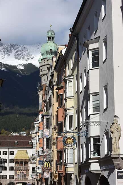 Innsbruck: Swarovski Exclusive Guided Tour with Drink & Gift - Entering Swarovski Kristallwelten in Innsbruck’s Old Town