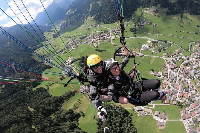 Paragliding & Tandemflüge with World Champion & Team, Stubaital - Landing, Packing, and the Post-Flight Certificate Moment