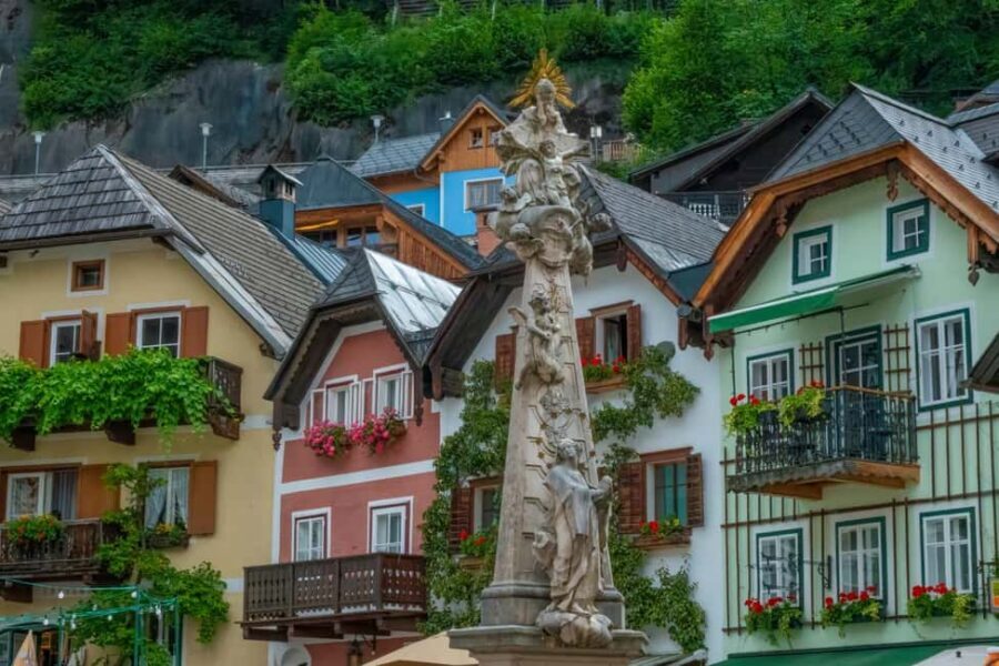 Private Walking Tour of Hallstatt Market Square and Churches - Evangelische Pfarrkirche Hallstatt: contrast across the lake