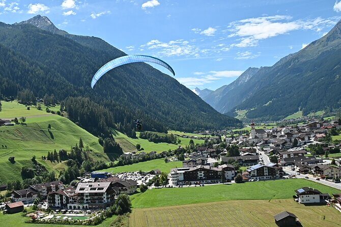 Tandem paragliding in the Stubai Valley near Innsbruck - Safety and Comfort: Helmet, Harness, and the Calm Coaching Style