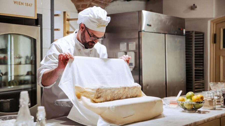 Vienna: Gerstner KuK Hofzuckerbäcker Baking Show & Tasting - The part you’ll remember: stretching strudel dough paper-thin