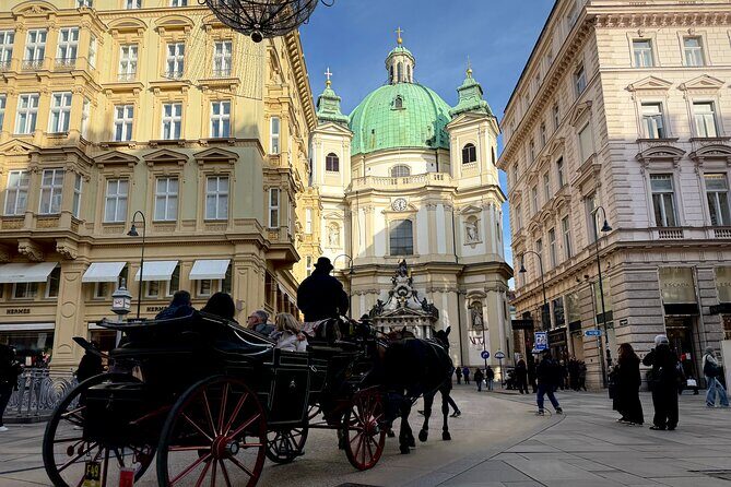 Vienna Guided Food Tour with 8 Food Tastings & A Secret Dish - Kurrentgasse 10 Cobblestones and the Ankeruhr Photo Moment