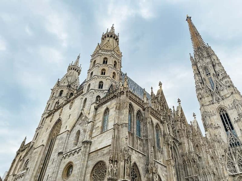 Vienna: Hidden Secrets and Local Stories Walking Tour - The historic center walk: courtyards, legends, and narrow streets