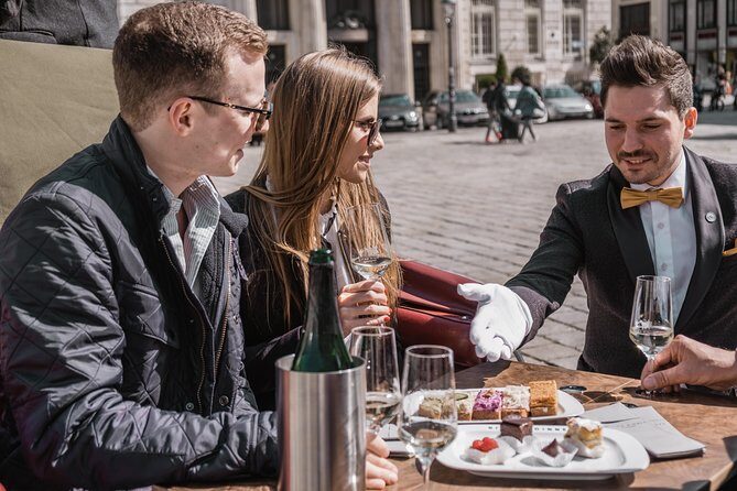 Vienna Horse-Drawn Carriage Ride with Sparkling Wine and Food - The inner-city route: Burgtheater to the Graben