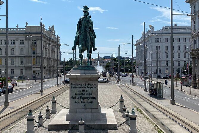 Vienna Secrets Walking Tour to Backyards and Mysterious Locations - Franciscan Church façade and Vienna’s cat café: small stops, good vibes
