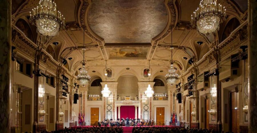 Vienna: Strauss and Mozart Concert at Hofburg Palace - Entering Hofburg Palace for a Strauss-and-Mozart night